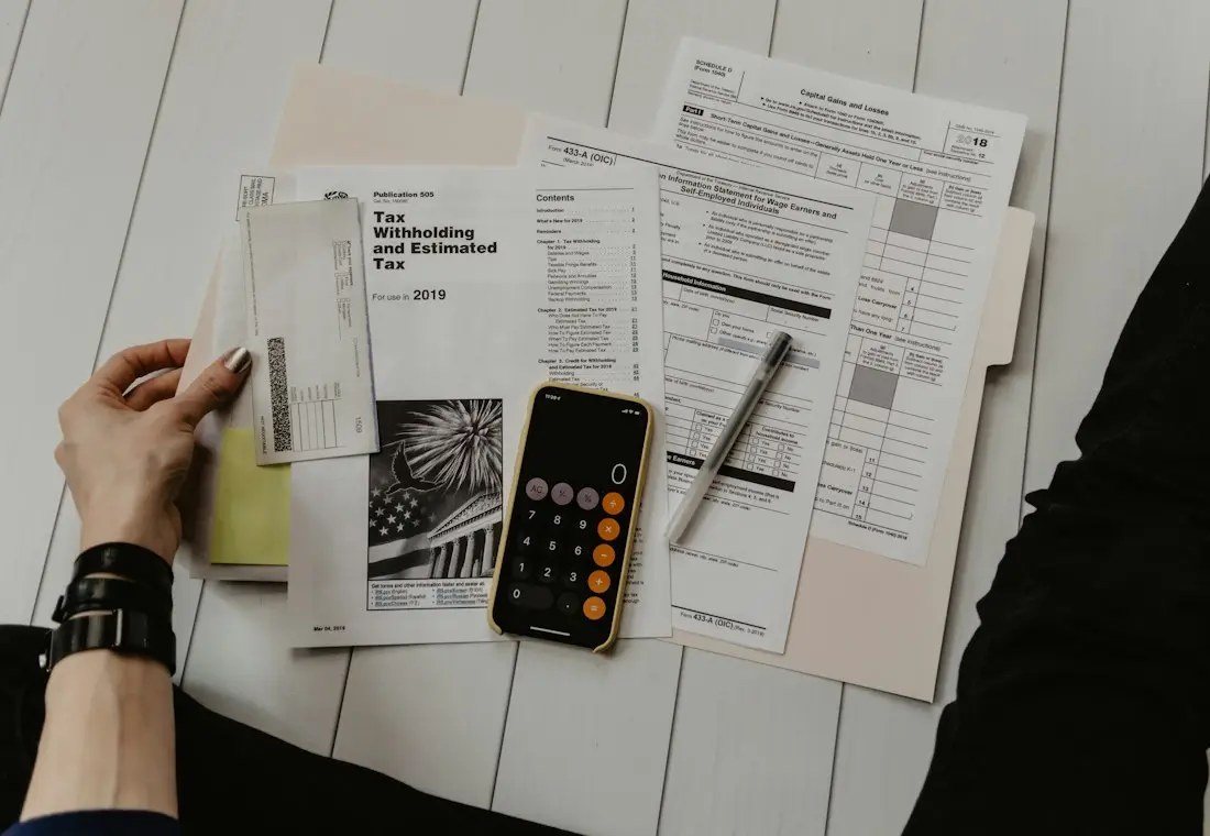 Organized business documents and records on a desk