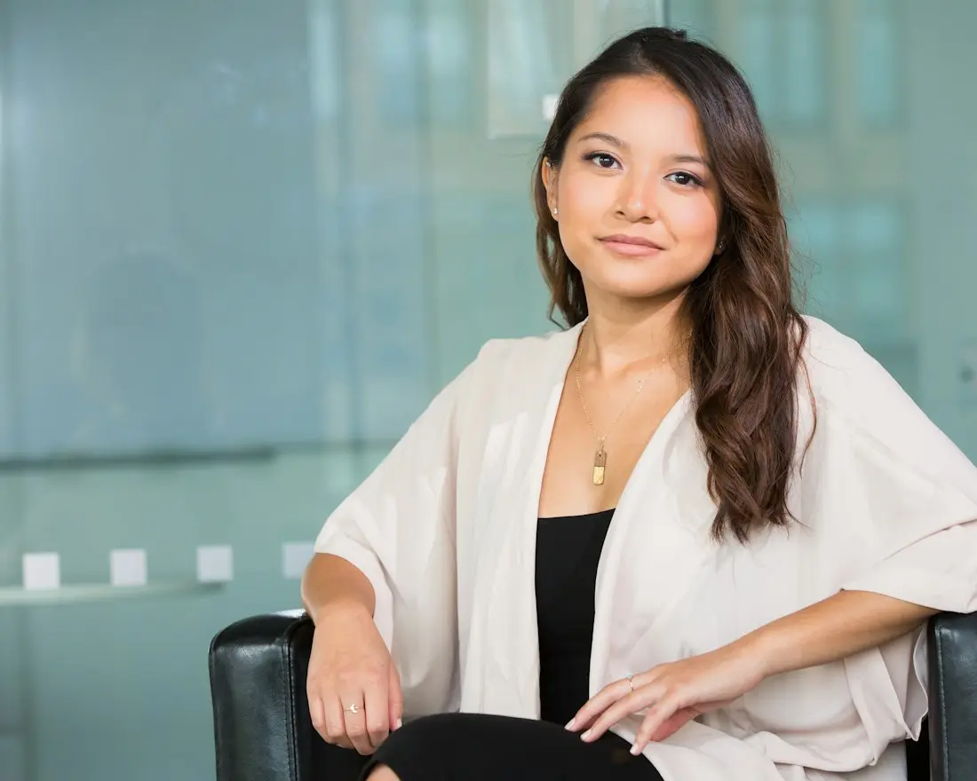 Confident small business owner seated in a bright modern office